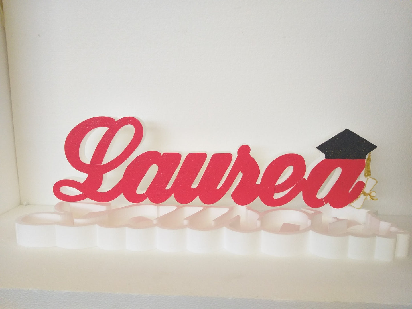 Laurea contenitore + tocco + diploma